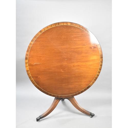 580 - A Late 20th Century Crossbanded Mahogany Snap Top Circular Dining Table, 104cm wide