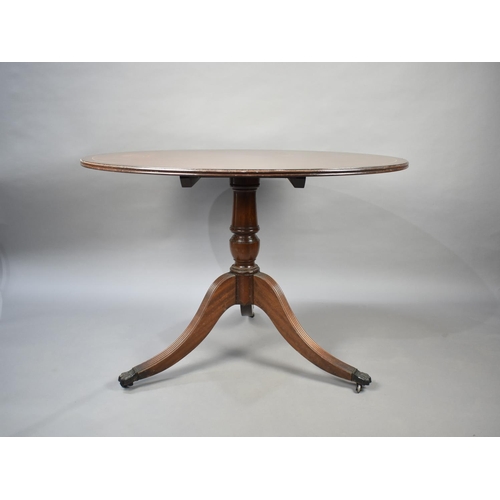 580 - A Late 20th Century Crossbanded Mahogany Snap Top Circular Dining Table, 104cm wide