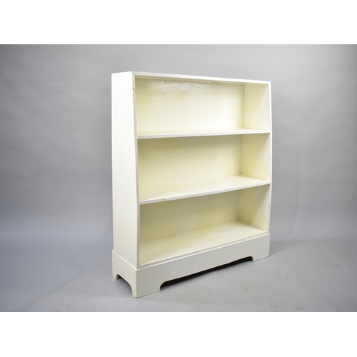 581 - A Mid 20th Century White Painted Three Shelf Open Waterfall Bookcase, 77cm wide