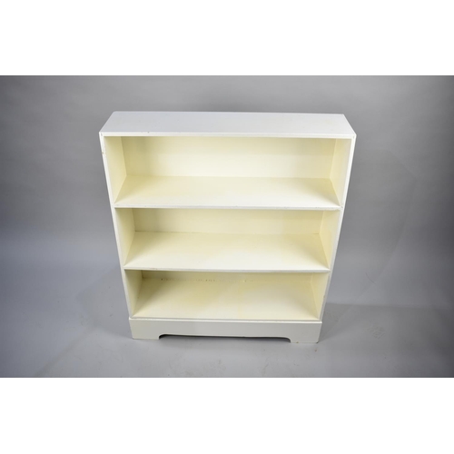 581 - A Mid 20th Century White Painted Three Shelf Open Waterfall Bookcase, 77cm wide