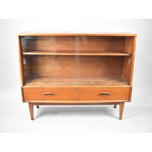 589 - A 1970's Glazed Bookcase with Two Base Drawers, 107cm wide