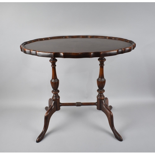 71 - A Mahogany Twin Pedestal Oval Topped Coffee Table, 60cm Wide and 43cm Deep