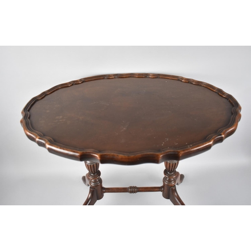 71 - A Mahogany Twin Pedestal Oval Topped Coffee Table, 60cm Wide and 43cm Deep