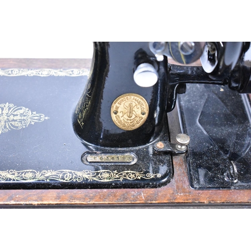 98 - A Vintage Cased Singer Manual Sewing Machine No.EF.634193