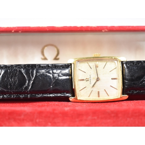 188 - A Vintage 18ct Gold Cased Ladies Omega Manual Wrist Watch, Champagne Face with Baton Hour Indicators... 