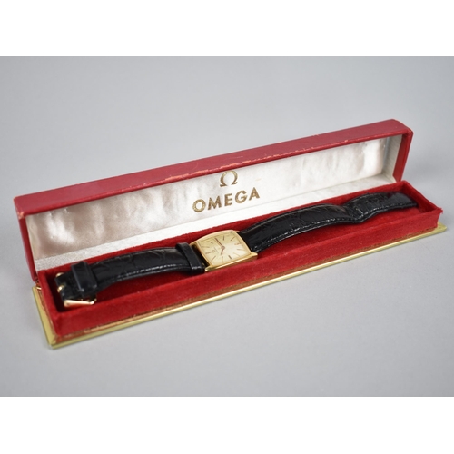 188 - A Vintage 18ct Gold Cased Ladies Omega Manual Wrist Watch, Champagne Face with Baton Hour Indicators... 