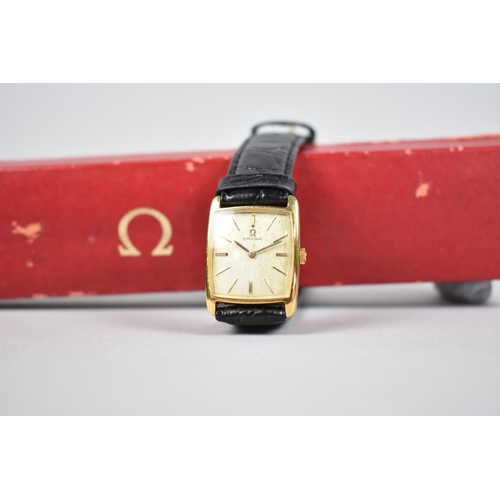 188 - A Vintage 18ct Gold Cased Ladies Omega Manual Wrist Watch, Champagne Face with Baton Hour Indicators... 