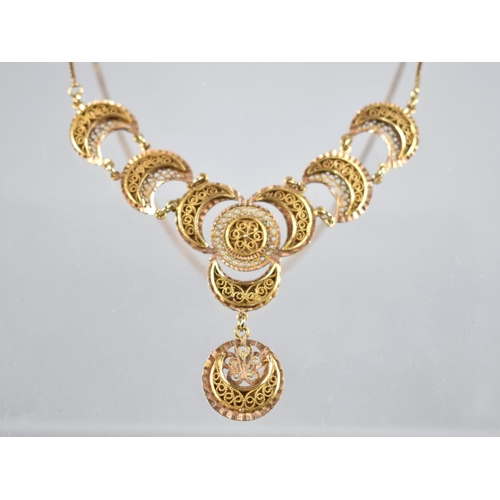 61 - A Two Tone Gold Metal Filigree Necklace Comprising Crescents Raised on Textured Plaques, Each 16mm W... 