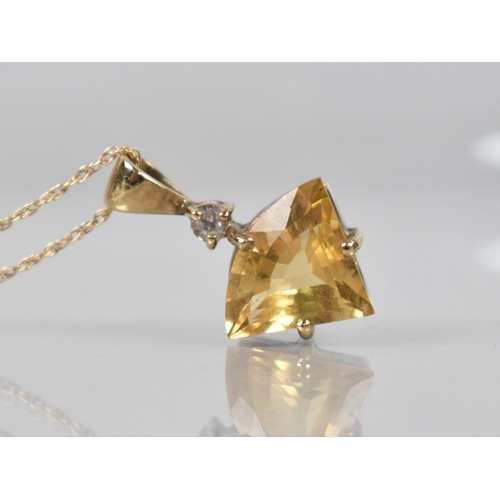 64 - A 9ct Gold, Citrine and CZ Stone Pendant, Fancy Cut Stone Measuring 14.8mm Wide, in Four Claws and w... 