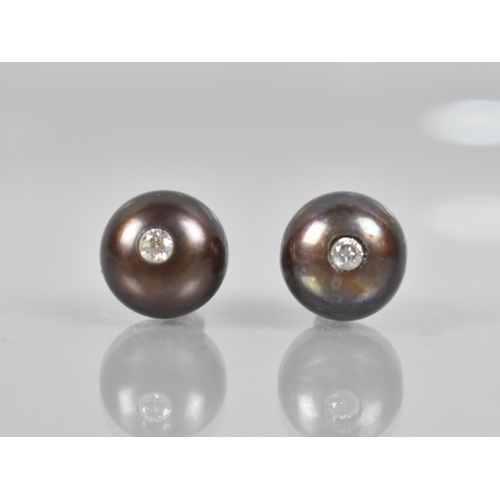 65 - A Pair of Chocolate Pearl Earrings Mounted to Centre with Single Round Cut Diamond Measuring Approx ... 