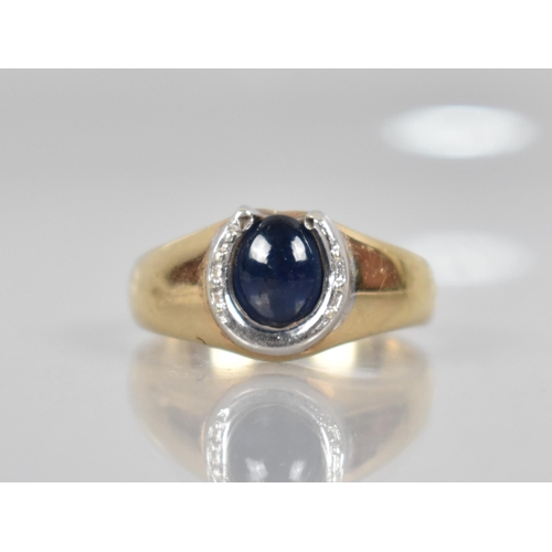 72 - A 9ct Gold and White Metal Cabochon Sapphire Mounted Dress Ring, Central Oval Stone Measuring Approx... 