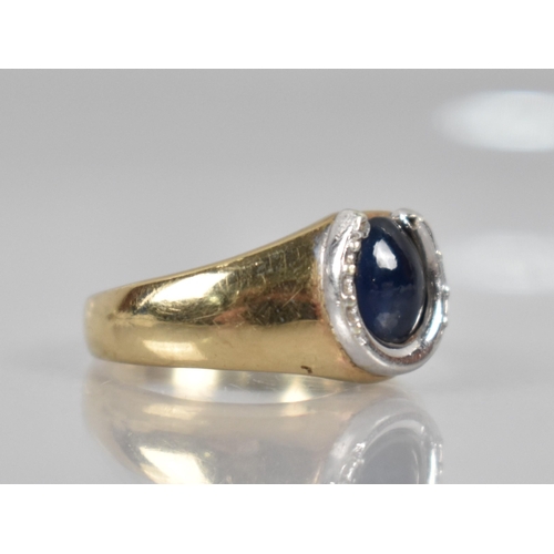 72 - A 9ct Gold and White Metal Cabochon Sapphire Mounted Dress Ring, Central Oval Stone Measuring Approx... 