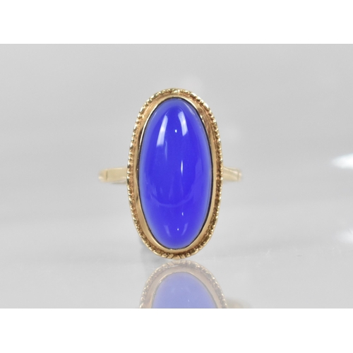 76 - A 9ct Gold and Blue Chalcedony Agate (untested) Dress Ring,  Oval Cabochon Stone Measuring 21mm by 1... 