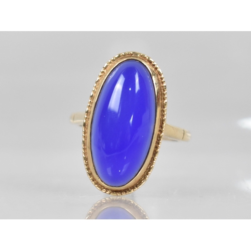 76 - A 9ct Gold and Blue Chalcedony Agate (untested) Dress Ring,  Oval Cabochon Stone Measuring 21mm by 1... 