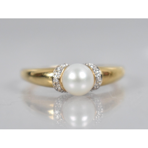 87 - An 18ct Gold Pearl and Diamond Ring, Central Round Pearl Measuring 6.4mm Diameter, White Metal Milgr... 