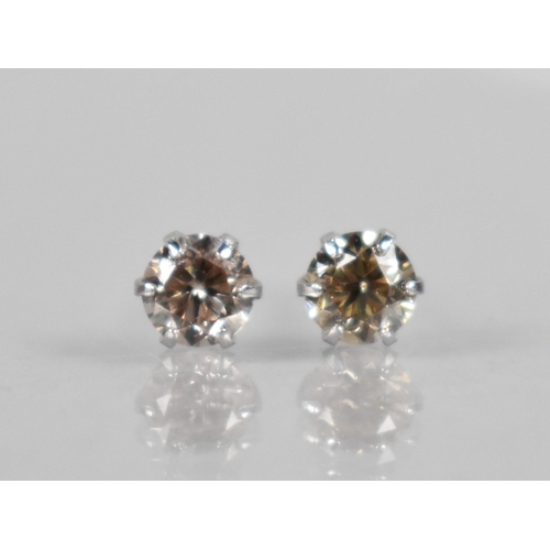 114 - A Pair of Diamond and Platinum Stud Earrings, Round Brilliant Cut Stones Measuring 0.30ct Each (0.60... 