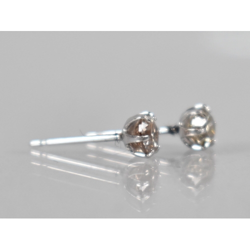 114 - A Pair of Diamond and Platinum Stud Earrings, Round Brilliant Cut Stones Measuring 0.30ct Each (0.60... 