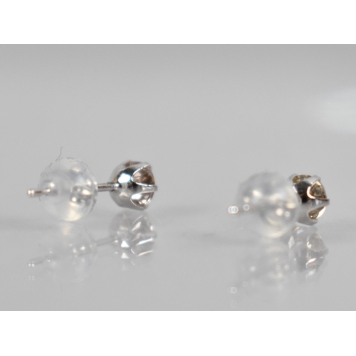 114 - A Pair of Diamond and Platinum Stud Earrings, Round Brilliant Cut Stones Measuring 0.30ct Each (0.60... 