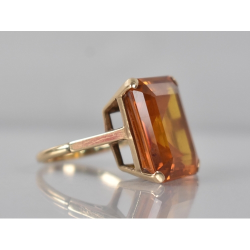 68 - A 9ct Gold and Untested Citrine Type Stone Cocktail Ring, Emerald Cut Stone Measuring 15.9mm by 18.1... 