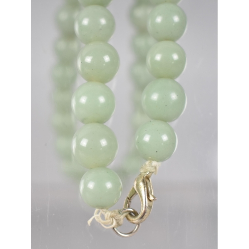 238 - A Single Row Jadeite Type Bead Necklace, Spherical Beads in Matched Colour but Varying Diameters Bet... 