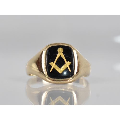 176 - A 9ct Gold Masonic Signet Ring, Rectangular Onyx Panel Measuring 11.3mm by 9.4mm, Wide Shoulders to ... 