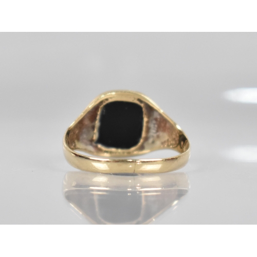 176 - A 9ct Gold Masonic Signet Ring, Rectangular Onyx Panel Measuring 11.3mm by 9.4mm, Wide Shoulders to ... 