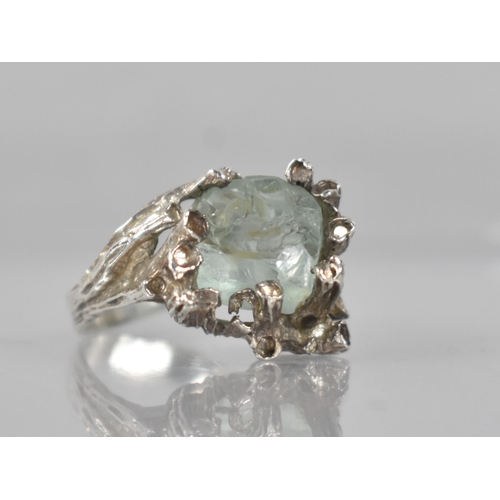 208 - A Silver and Raw Aquamarine Mid Century Brutalist Ring, Large Asymmetric Centre Stone Measuring 9.8m... 