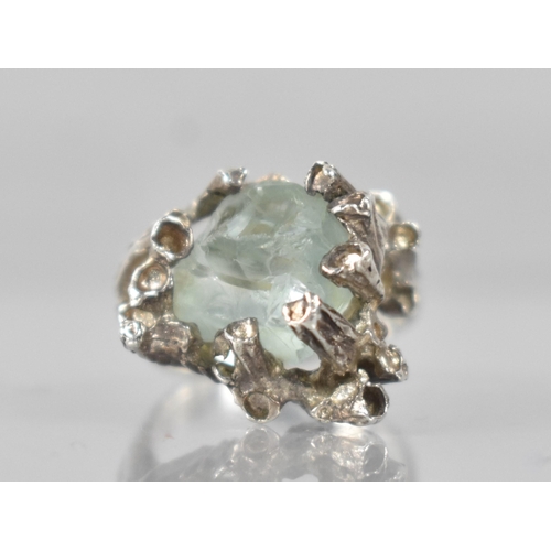 208 - A Silver and Raw Aquamarine Mid Century Brutalist Ring, Large Asymmetric Centre Stone Measuring 9.8m... 