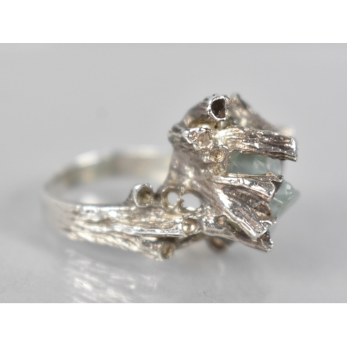 208 - A Silver and Raw Aquamarine Mid Century Brutalist Ring, Large Asymmetric Centre Stone Measuring 9.8m... 