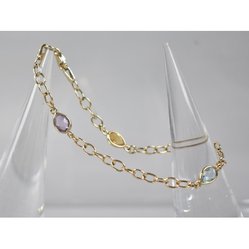 100 - A 9ct Gold Multi-Jewelled Bracelet, Three Pear Cut Stones Comprising Topaz, Amethyst and Citrine (Ea... 