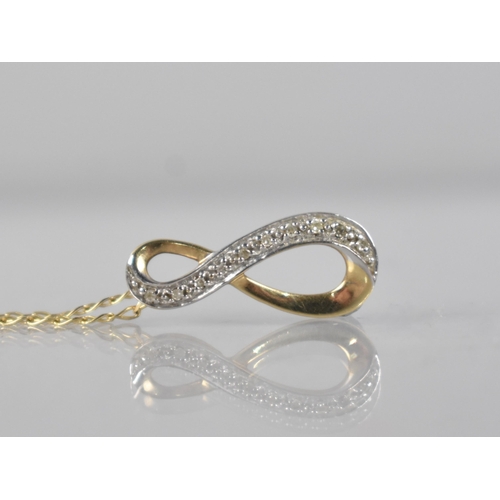 101 - A Diamond Mounted Pendant on 9ct Gold Chain, Ten Round Cut Diamonds Milgrain Set in White Metal to a... 