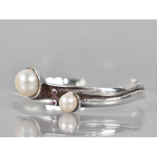 213 - A Modernist Silver Cuff having Pearl and Ruby Embellishments, Collet Mounted Stones to a Folded Orga... 