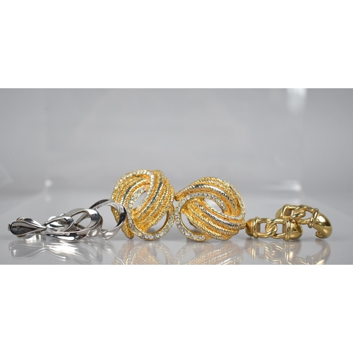 218 - A Vintage Pair of Givenchy Gilt Metal Pierced Earrings, A Pair of Trifari Silvered Clip on Examples ... 