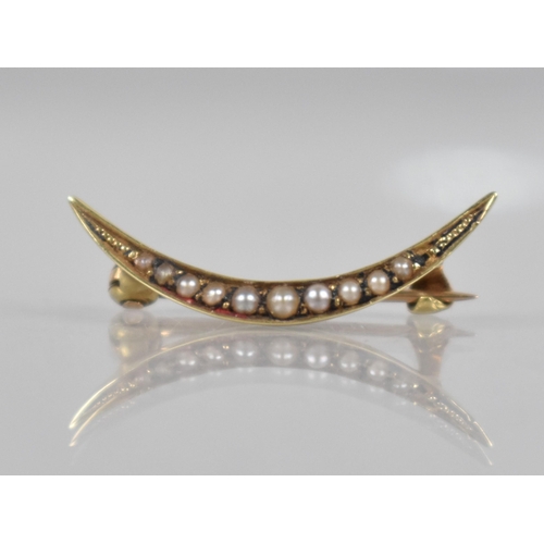 107 - A Victorian 14ct Gold and Seed Pearl Crescent Moon Brooch, 24.2mm Wide, Missing One Pearl, Stamped t... 