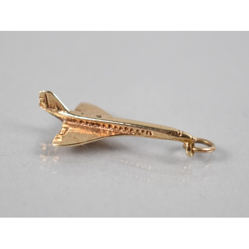 120 - A 9ct Gold Pendant/Charm, Concorde, Makers Mark AJH, 1.6gms, Birmingham 1973, 25.8mm Long