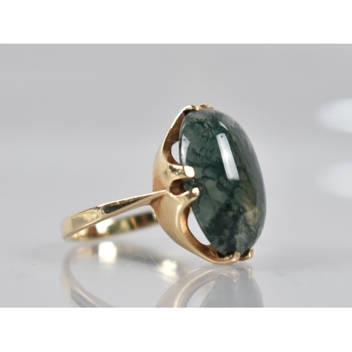 27 - A 9ct Gold Mounted Moss Agate Ring, Cabochon Stone Measuring 18mm by 13mm Set in Split Claws, Revers... 