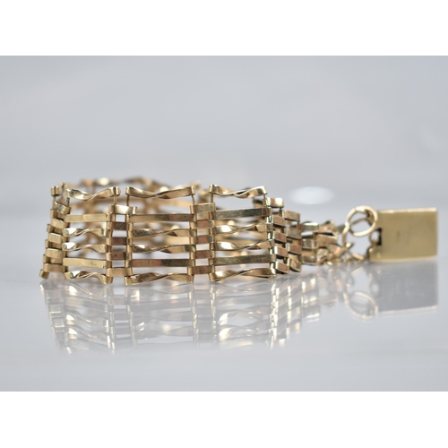 157 - A Six Bar Gate Link 9ct Gold Bracelet, Rectangular Padlock Clasp Stamped for R&G Ltd, 13.7gms