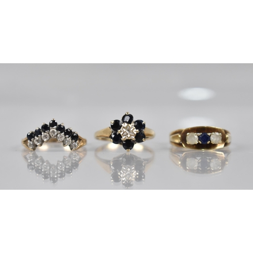 121 - A Collection of Three 9ct Gold and Dress Rings to include Sapphire and Diamond Cluster Example, Size... 