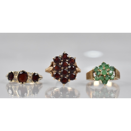 122 - A Collection of Three 9ct Gold Jewelled Ladies Dress Rings to include Ten Stone Garnet Example with ... 