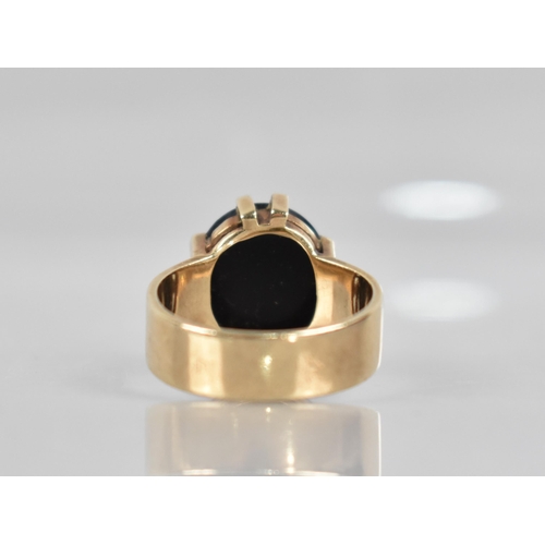 123 - A Onyx and 9ct Gold Signet Ring, Oval Onyx Panel Measuring 14mm by 12.2mm Diameter Raised in Ten Wid... 