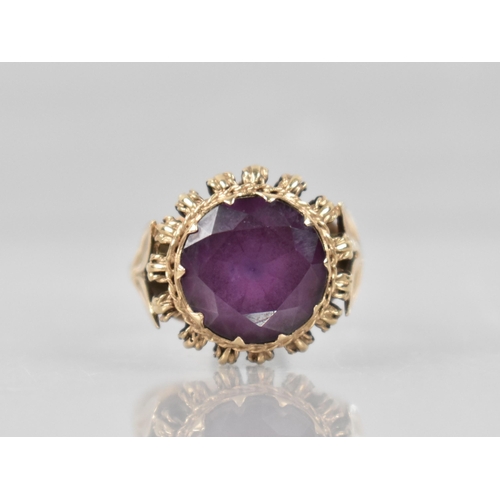 26 - A 9ct Gold and Amethyst Ladies Dress Ring, Large Round Cut Stone Measuring 12.3mm Wide, Ten Claws an... 