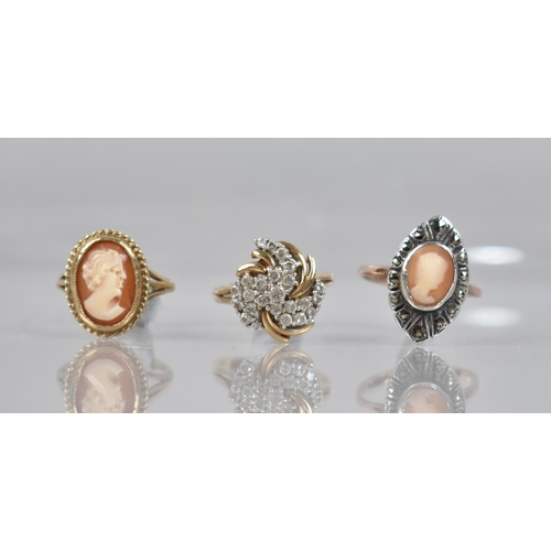 126 - A 9ct Gold Multi Stone Ring, Round Cut White Stones in White Metal Claw Mounts, Tiered Swirling Spra... 