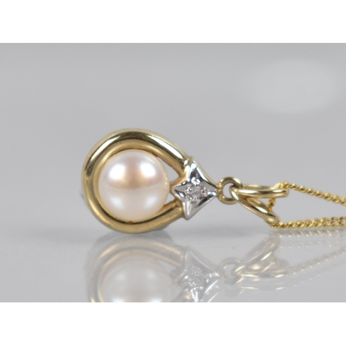 127 - A 9ct Gold Pendant, Pearl with Bead Bright Set Diamond, on 9ct Gold Italian Flattened Curb Link Chai... 