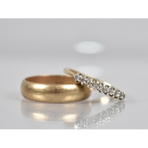 128 - A 9ct Gold Half Eternity Ring, Mounted with Round Brilliant Cut Diamonds in White Metal to a Plain P... 