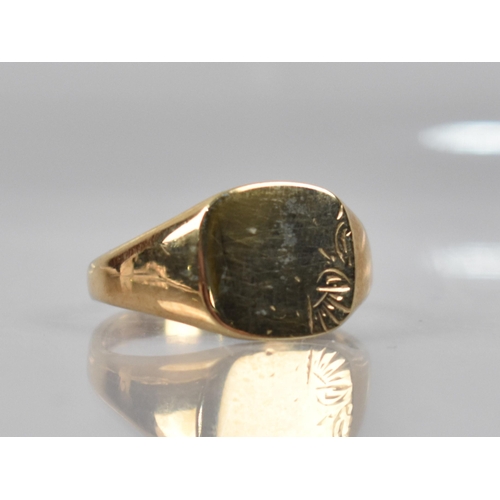 164 - A 9ct Gold Signet Ring, Rectangular Panelled Head to Wide Tapered Shoulders and a Plain Polished Ban... 