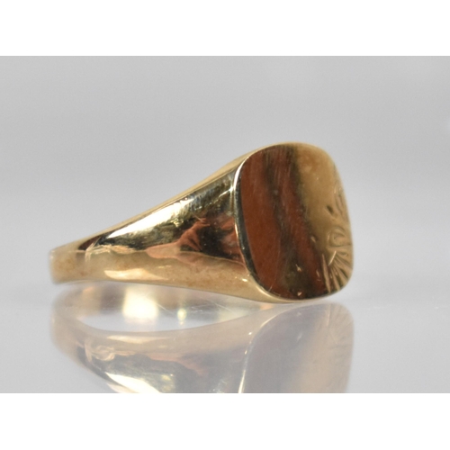 164 - A 9ct Gold Signet Ring, Rectangular Panelled Head to Wide Tapered Shoulders and a Plain Polished Ban... 