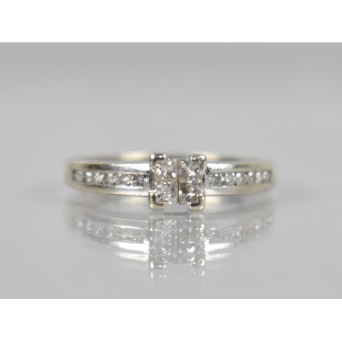 138 - A 9ct White Gold and Diamond Ring Comprising Four Square Cut Diamonds Measuring 1.9mm Square Each, T... 