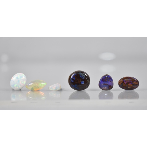 139 - A Collection of Six Loose Opal Stones (Untested), to comprise Oval Cabochon (10.1mm by 8.5mm by 3.9m... 