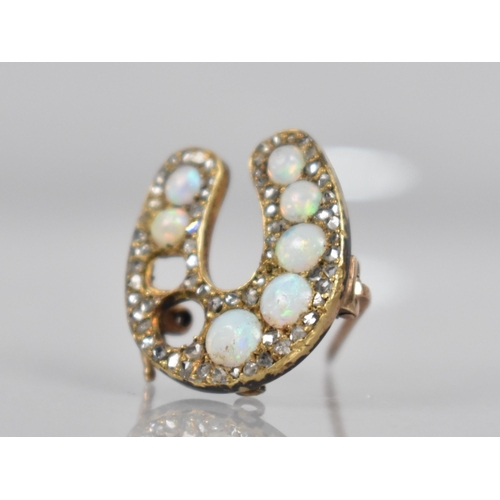 45 - A Late 19th/Early 20th Century Opal and Diamond Brooch, Horseshoe, Seven Graduated Opals (Two Missin... 