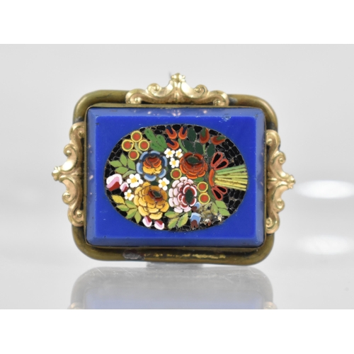 254 - A Pretty Victorian Micro Mosaic Brooch depicting Flowers Tied with Ribbon in Black Oval and on Blue ... 